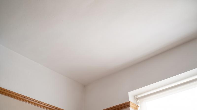 The same ceiling repaired and repainted by Kaminskiy